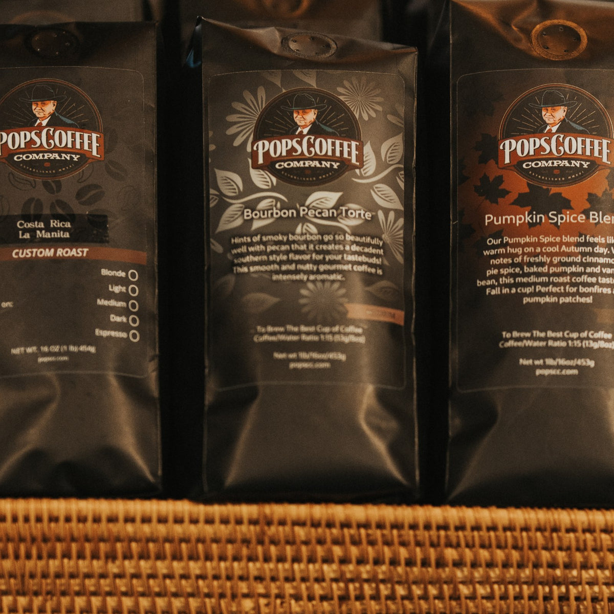 Pops Bourbon Pecan Torte bags in a woven basket at a cafe