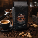 Chocolate Peanut Butter Bliss lifestyle image 2: coffee bag on a rustic coffee bar with espresso cup, chocolate, and peanuts