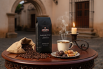Pops Coffee Company Guatemalan Antigua bag on elegant dark wood in colonial Antigua setting with chocolate truffles and caramel