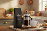 Pops Coffee Company Cafe Blend bag on a cozy home kitchen counter with steaming coffee and French press