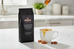 Pops Coffee Company Brazil Bela Vista Yellow Bourbon bag on white marble with steaming coffee and honey drizzle