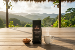 Pops Coffee Company Jamaican Blue Mountain bag on a tropical Jamaican veranda with steaming coffee and Blue Mountain rainforest
